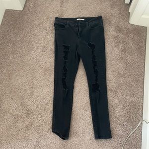 Levi’s blacked ripped skinny jeans